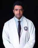 Dr Sibu Simon